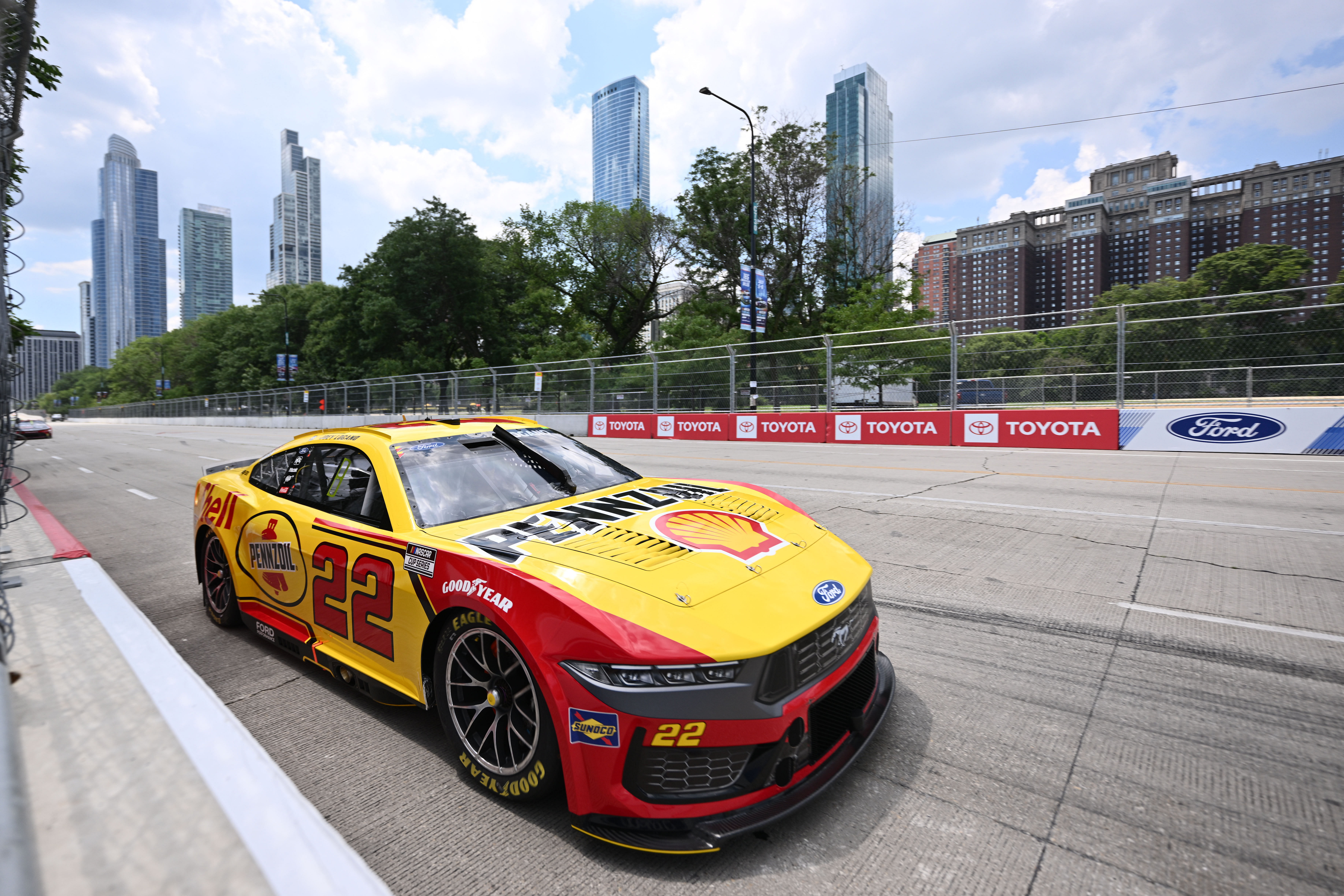 Joey Logano driving the #22 Ford Mustang on the streets of Chicago - Source: Imagn